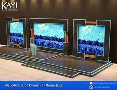 three televisions on display in a showroom with the caption visualize your dream realistic