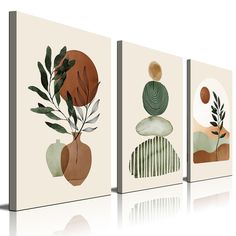 three canvases with plants and rocks on them