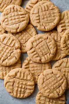 a close up of cookies on a table with the words keto lemon cookies above it