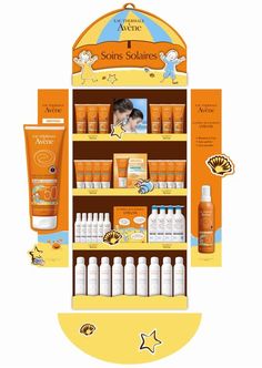 an orange shelf filled with lots of different types of sunscreens and lotions