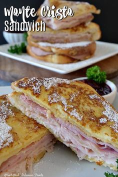 ham and cheese sandwich cut in half on a plate