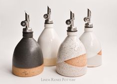 three different types of salt and pepper shakers on a white background with the words london rence pottery