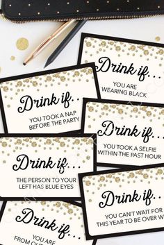 four black and white drink tags with gold confetti on them