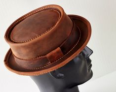 Leather Pork Pie Hat PPH-58 Men's and Women's Headwear - Etsy Vintage Leather Hat With Flat Bill, Vintage Leather Flat Bill Hat, Classic Leather Fedora With Flat Crown, Classic Brown Hat With Waxed Finish, Vintage Leather Hat With High Crown, Vintage High Crown Leather Hat, Vintage Leather Top Hat With Flat Crown, Classic Leather Top Hat With Flat Brim, Classic Leather Hat With Flat Bill