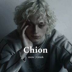 a man sitting down with his hand on his head and the words chion above him