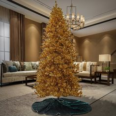 a gold christmas tree in the middle of a living room