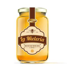 a jar of honey with the label la mieleria on it's lid