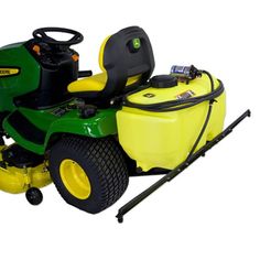 a green and yellow lawn mower sitting on top of a white background