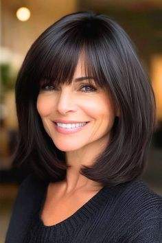 Save this pin for the best medium-length hairstyles for women over 50 with bangs. Rounded edges give this long bob (lob) style a bit more shape and volume, making it feel fuller. The bangs soften the look and give it some extra style. Medium Angled Bob, Lob With Long Bangs, Long Bob With Side Bangs, Angled Bob With Bangs, Medium Angled Bobs, 70 Hair, Hair Lightening