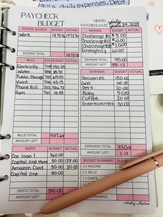 a pink and white checkbook next to a pen on top of a table with other items Budgeting Notebook Ideas, Diy Budget Planner Notebook, Paycheck Tracker, Biweekly Budget, Budget Planner Book, Budgeting For Beginners, Budget By Paycheck, Monthly Budget Planning, Saving Money Chart