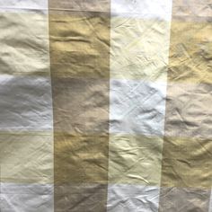 a white and yellow checkered table cloth