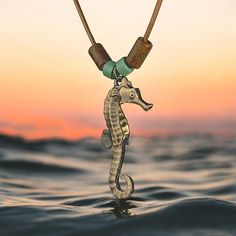 SEAHORSE GIFTS FOR SEAHORSE LOVERS - Graceful and shy is the amazing seahorse. One of the most iconic forms of marine life. This will feel more like a pet than animal jewelry. Artist Roland St John's hand crafted sea horse design with colored ceramic accent beads from the Island of Mykonos Greece is an original and unique seahorse gift. This life-like style makes it great for everyday wear. If you are seahorse necklace shopping look no further you have found the perfect gift for any occasion PRI Sea Horse Jewelry, Seahorse Necklace, Seahorse Pendant, Jewelry Artist, Horse Jewelry, Mykonos Greece, Sea Horse, Horse Designs, Ocean Lover