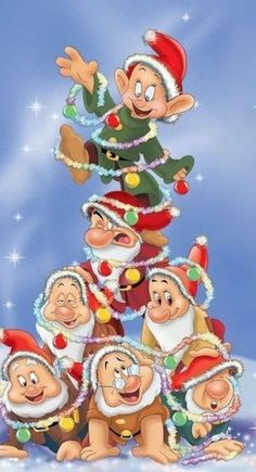 an animated christmas tree with many dwarfs around it