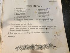 the menu for zucchini soup is displayed in an old style restaurant brochure