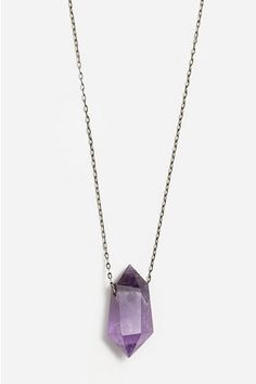 A powerful healing stone, this hand selected amethyst crystal rests on a 22 sterling silver chain. Amethyst has been celebrated throughout the centuries for it s beautiful lavender hue and ability to bring forth the purest aspirations of the wearer. It is thought to enhance intuition, while also calming the mind and spirit. We love amethyst as a stone to wear or hold during morning meditation or quiet, grounding moments in your day. Note: each stone is one-of-a-kind so there may be slight variat Purple Sterling Silver Spiritual Necklaces, Spiritual Faceted Amethyst Crystal Necklace, Purple Amethyst Necklace With Raw Stone, Spiritual Purple Necklace With Large Stone, Faceted Amethyst Healing Necklace, Lavender Natural Stones Sterling Silver Necklaces, Spiritual Lavender Amethyst Jewelry, Purple Jewelry With Large Stone For Healing, Lavender Sterling Silver Necklace With Natural Stones