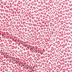 a red and white animal print fabric