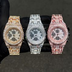 - Case Size: 42mm - Movement: Quartz Movement - Sizing: 7-inch band - Adjustable: Links are removable to fit your wrist - Lock: Fold-over Clasp - Stone: VVS Diamond Simulate - Case Material: Alloy Iced Out Diamond Watch As A Gift, Iced Out White Gold Watch Gift, Diamond White Watch With Rhinestones As Gift, Diamond White Rhinestone Watch For Gift, Cubic Zirconia Diamond Watch With Bling, Diamond White Quartz Watch, Diamond White Quartz Diamond Watch, Silver Iced Out Watch Accessories For Gifts, Luxury Crystal Watches For Formal Occasions