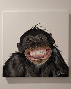 a painting of a monkey with its mouth open and teeth missing, on a white wall