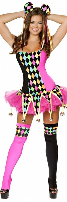 a woman in a pink and black costume is posing for the camera with her hands on her head