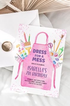 a pink apron birthday party card with the words dress for a mess written on it