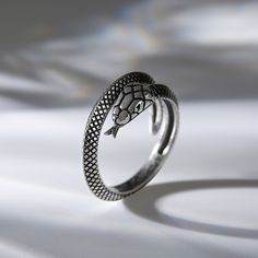 Snakes have always played an integral role in religion, mythology, and literature. The snake ring, in polished sterling silver, calls on the inner wisdom of its wearer; reminding them with each new day, they have the opportunity to rebirth into the best versions of ourselves.Material: Plating Color: Silver Silver Symbolic Snake Shaped Ring, Silver Snake-shaped Ring For Formal Occasions, Silver Snake Ring For Formal Occasions, Silver Symbolic Snake Promise Ring, Sterling Silver Mens Rings, Inner Wisdom, Snake Ring, Mens Silver Rings, The Snake