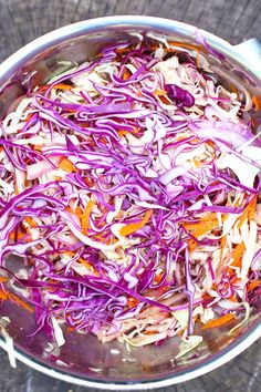 a pot filled with red cabbage and carrots