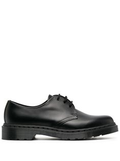 Black leather '1461' Derby shoes from Dr. Martens. Please note this item is unisex and sold in men's sizing.