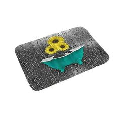 a green bathtub with sunflowers in it on a white background and gray floor