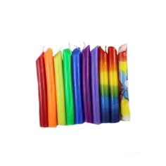 multicolored candles are lined up in a row