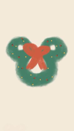 an image of a mickey mouse with a wreath on it