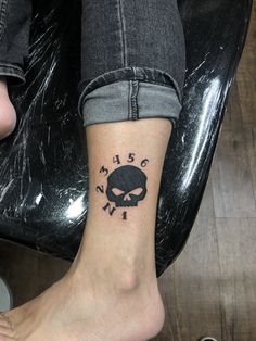 a person with a tattoo on their foot