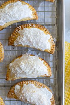 coconut cream filled pastries cooling on a wire rack, ready to go into the oven