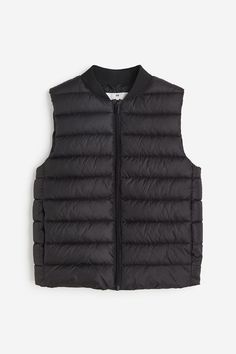 Lightly padded puffer vest in quilted  woven fabric. Ribbed stand-up collar  zipper at front with anti-chafe chin guard  and discreet side pockets. Lined. Anti Chafing, Womens Puffer Vest, Black Kids, Puffer Vest, Womens Vest, Stand Collar, Stand Up, Woven Fabric, Collar Styles