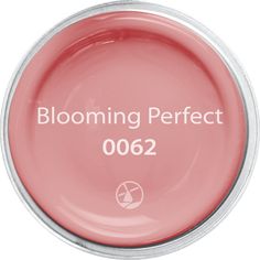 a pink nail polish with the words, blooming perfect 0062 on it