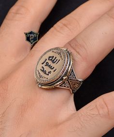 "Seal of Prophet Muhammad Engraved Ring, 925 Sterling Silver, Religious Ring, İslamic Silver Ring, Turkish Handmade Ring, Rings For Muslim ✦ Details ✦ * Material: 925 Sterling Silver * Weight: 18.50 grams * Sides oxidized. * Stamp: 925 * Available sizes; 5 US to 16 US. Contact me if you need any other size! ✦ Shipping ✦ * Processing time: 1-3 business days. * This item ships from my Turkish workshop in Istanbul. * Add your phone number in address box for a smoother delivery. That makes courier personnel's job easier.  ✦ Packaging ✦ * Comes with a luxury gift box and a jewellery cleaning cloth and courtesy gift. ✦ Returns, Exchanges ✦ * Return option available for 30 days after the delivery. * The product has to be in the same shape, type, and material. * Personalized products can't be retu Arabic Rings For Women, Antique Silver Signet Ring For Gift, Dur E Najaf Ring, Durre Najaf Rings, Islamic Rings For Men, Luxury Gift Box, Engraved Rings, Personalized Products, Cleaning Jewelry