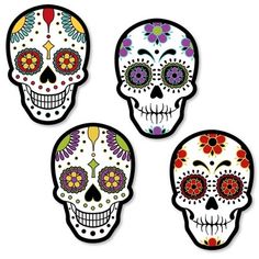 three sugar skulls with colorful flowers on them