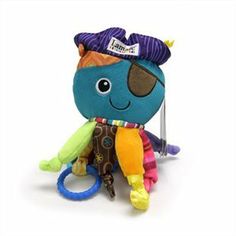 an octopus stuffed animal with a hat on it's head and holding a ring