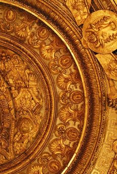 black and white photograph of an ornate ceiling