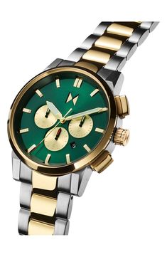 This sleek, modern watch is cleanly styled with a guilloche dial, slender cutout hands, alternating stick indexes and a two-tone brushed-finish bracelet. 44mm case, 18mm band width Deployant clasp closure Quartz movement Mineral crystal face Stainless steel Imported Mvmt Watches, Green Watch, Mens Tools, Modern Watches, Rollerball Perfume, Quartz Bracelet, Designer Clothes For Men, Minerals Crystals, Women's Summer Fashion