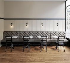 an empty restaurant with tables and chairs