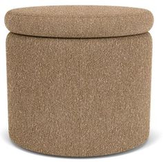 a round ottoman that is made out of wool and has a brown cover on top