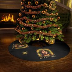 a christmas tree with an image of jesus on the bottom and gold ornaments around it