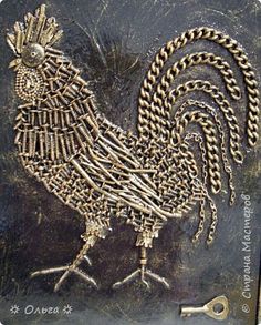 a metal plate with a rooster on it's side and chains around its neck