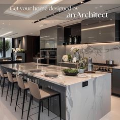 a large kitchen with an island in the middle and lots of counter space on each side