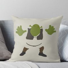 a green frog with two hands on it's chest and legs in the air throw pillow