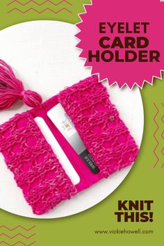 a pink card holder with a tassel on it and the words, eyelet card holder knit this