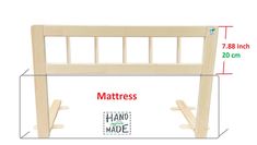 a wooden bed frame with measurements for the headboard