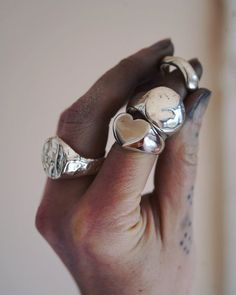 Chunky and delicious. I MASSIVE love heart for your finger. First carved from wax, then sandcast using 100% recycled silver. The heart ring is weighty but very comfortable. Perfect for an everyday statement Piece.  MADE FOR YOU: The dimensions of your ring will be individually modelled to suit your chosen ring size. The over all size of the heart will be based on the width of your finger and scaled appropriately. This design is intentionally heavy so no matter the ring size it will still have a Chunky Heart Ring, Chunky Silver Ring, Chunky Silver Jewellery, Wire Jewelry Rings, Chunky Silver Rings, Silver Heart Ring, Silver Signet Ring, Dope Jewelry, Chunky Rings