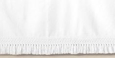 image 0 Affordable Nursery Furniture, White Bed Skirt, Macrame Fringe, Tassel Curtains, Crib Skirt, Crib Skirts, White Flat, White Tassel, Ruffles Fashion