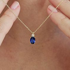 This 14K Gold Oval Cut Sapphire Necklace is designed carefully to brighten your neck. It is suitable for everyday use as well as for your special days. Can be a perfect gift with its stylish and ambitious look. Sapphires have been valued for centuries and have often been associated with qualities such as wisdom, loyalty, nobility, and sincerity. They have a rich history in various cultures and are often linked with royalty and spirituality. Not only on a bracelet or necklace but also in all jewe Sapphire Necklace Simple Zales, Blue Sapphire Necklace Simple, Gold And Sapphire Necklace, Dainty Oval Sapphire Jewelry, Blue Oval Pendant Necklace In Dainty Style, Blue Oval Pendant Necklace With Birthstone, Blue Oval Birthstone Necklaces, Blue Oval Pendant Necklace For Anniversary, Blue Birthstone Necklace With Oval Pendant